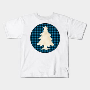 Christmas tree silhouette over a black and blue tile pattern Kids T-Shirt